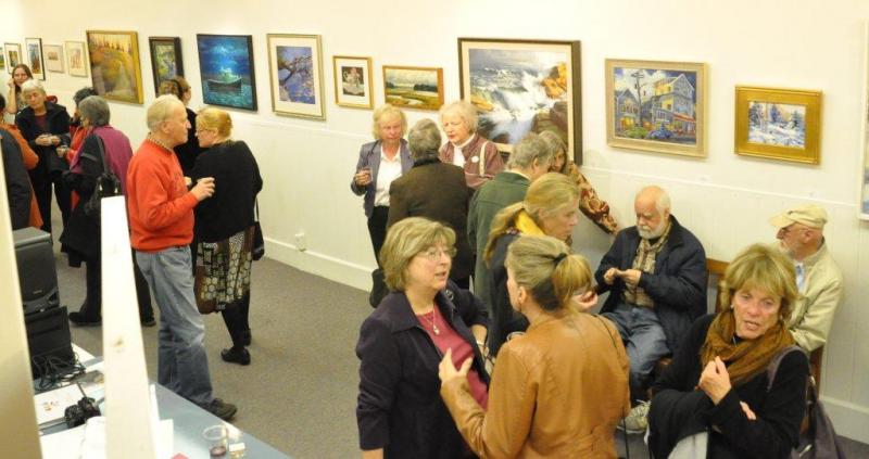 A crowd gathers Saturday at the third annual ArtinMe event at the Boothbay Region Art Foundation. Bremen's Claire Hancock won best in show for her painting titled “Pink 'Knock-Out' Roses.”  The event will be on display until November 3. BEN BULKELEY/Boothbay Register
